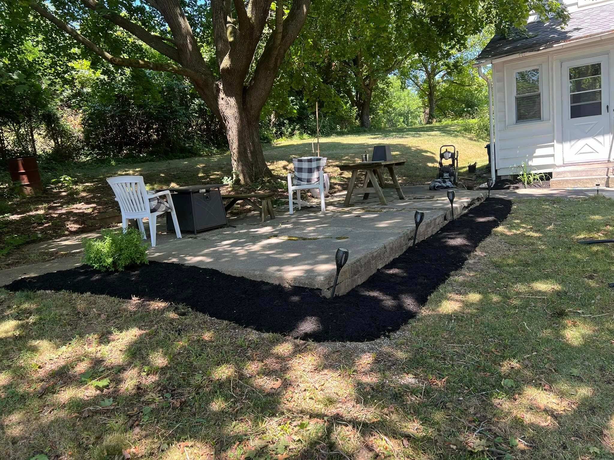 landscaping project, backyard patio and mulch beds