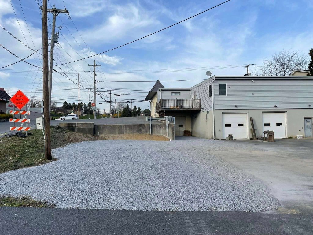 newly regraded gravel drive at a business