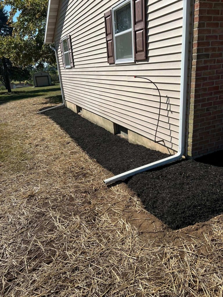 mulching and replanting grass, landscaping